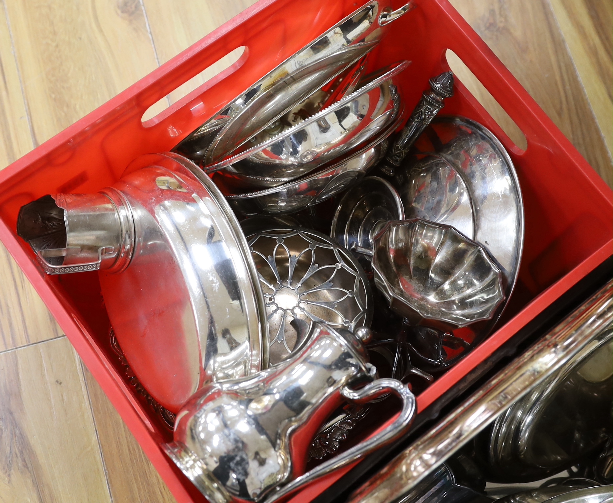 An assortment of silver plated ware including breakfast dishes, oval tray and vases